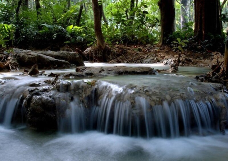 Small Waterfall in Forest — Serene, Blue