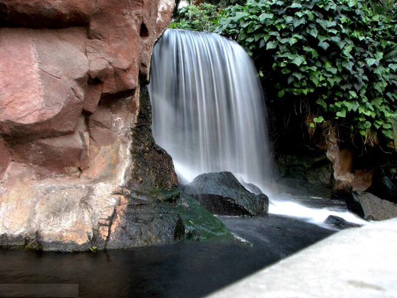 Small Waterfall in Garden — Green, Serene, Photograph