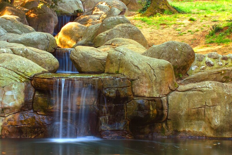 Small Waterfall in Rocks — Brown, Serene
