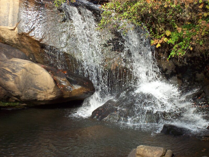 Small Waterfall on Rocks — Brown