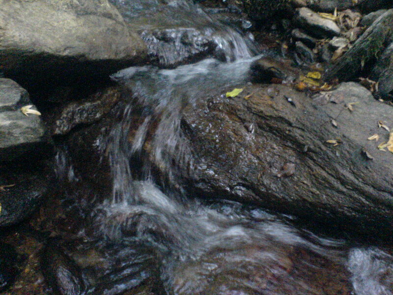 Small Waterfall over Rocks — Brown, Calm