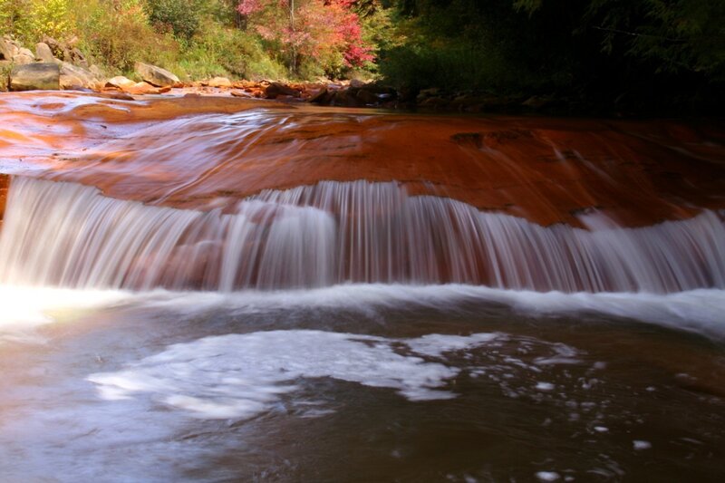 Small Waterfall over Rocks — Brown