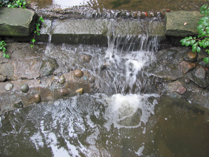 Small Waterfall over Rocks — Gray, Calm