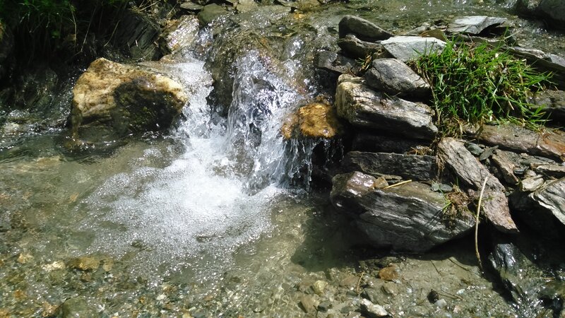Small Waterfall over Rocks — Green, Serene, Afternoon, Photograph