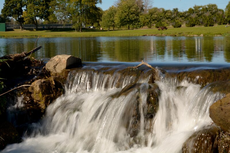 Small Waterfall over Rocks — Green, Serene, Afternoon