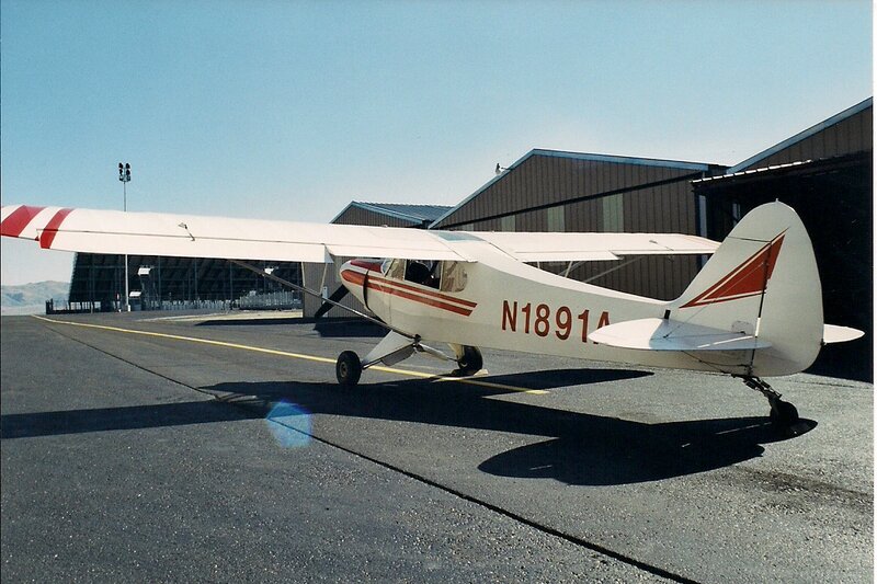 Small White Airplane — Calm, Afternoon, Photograph