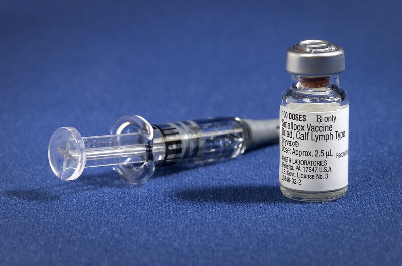 Smallpox vaccine vial and syringe
