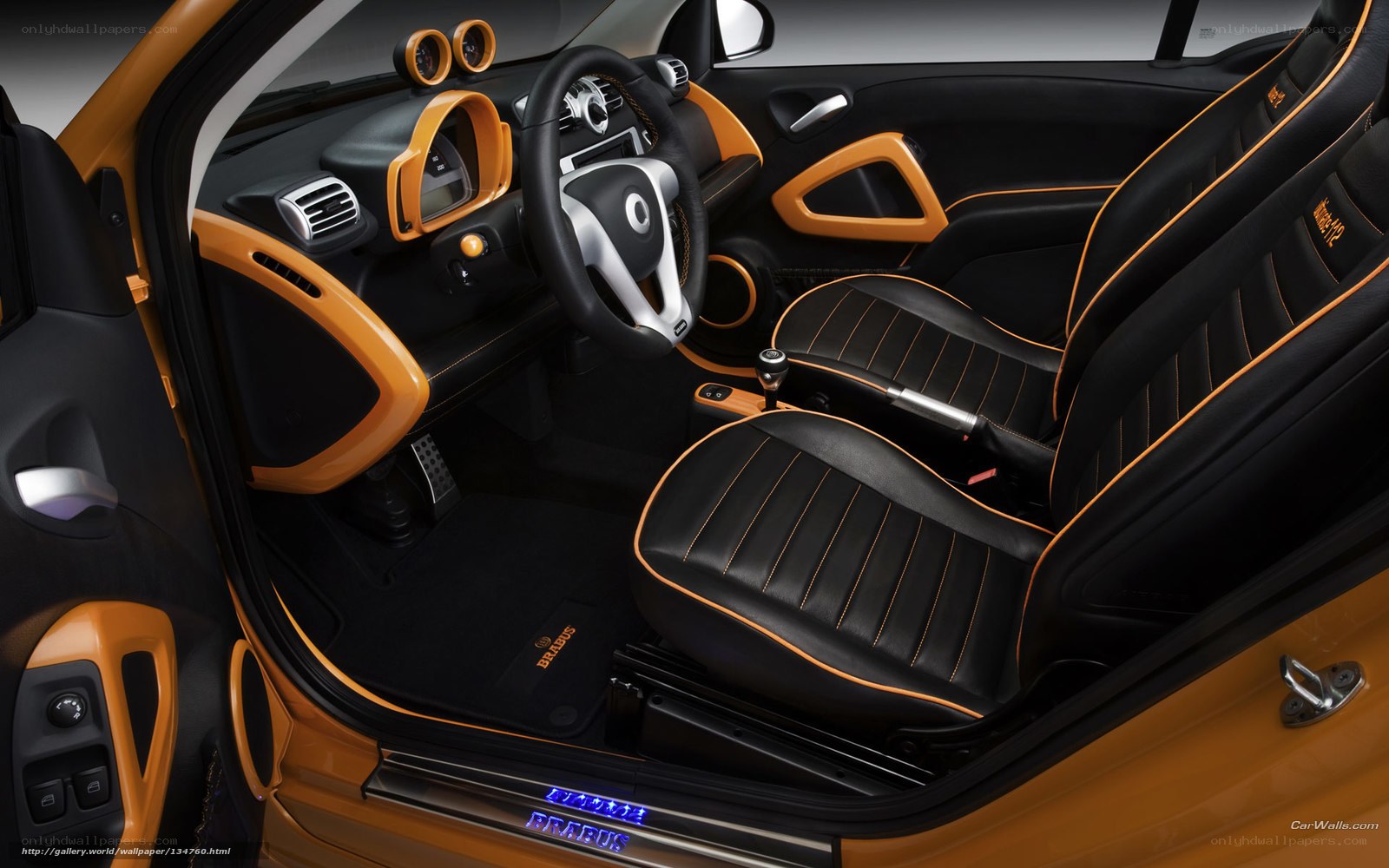 smart car interior with orange accents