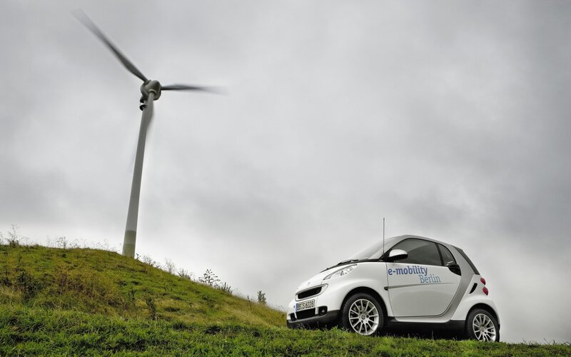 Smart car near wind turbine
