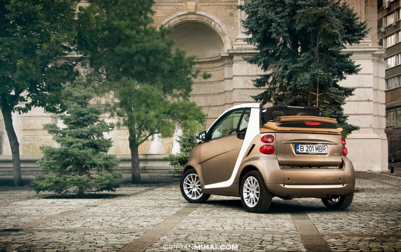 Smart car on cobblestone street