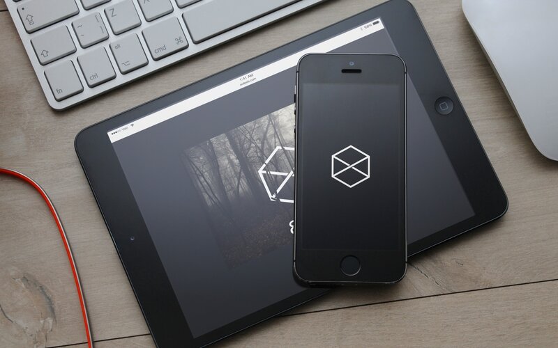 smartphone and tablet on desk