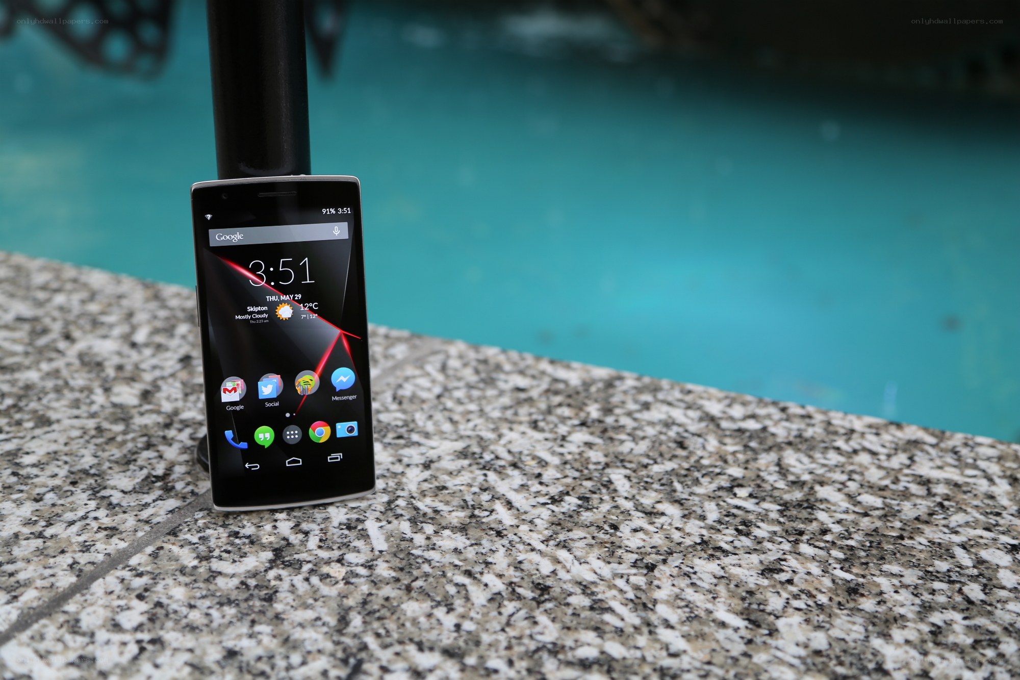 Smartphone by poolside