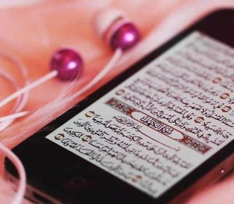 Smartphone Displaying Quran