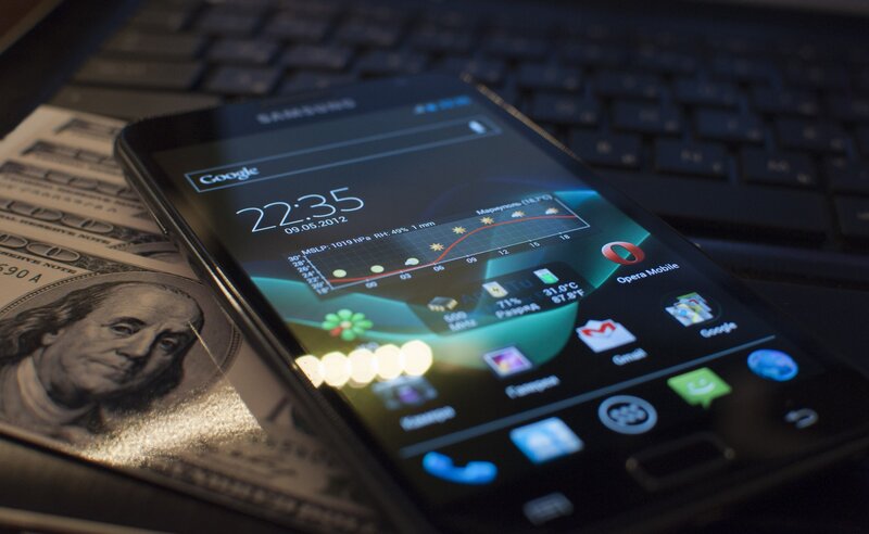 Smartphone on Money — Black, Dramatic, Night