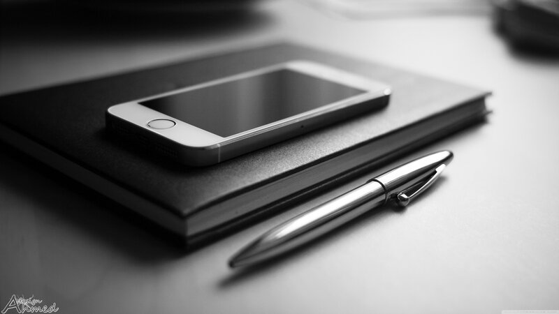 Smartphone on Notebook — Black, Minimalist