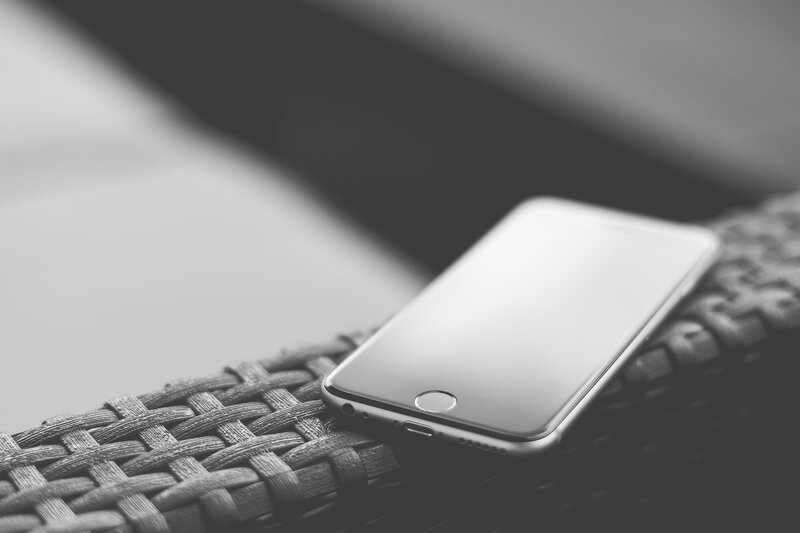 smartphone on woven surface
