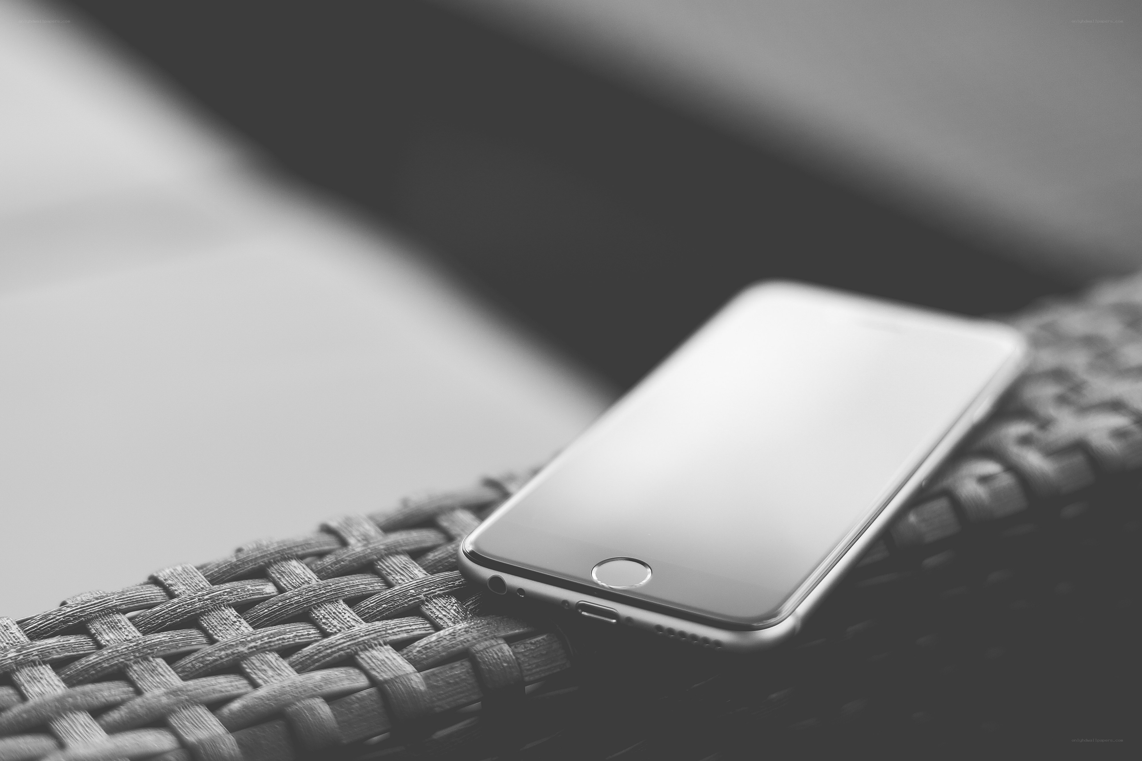 smartphone on woven surface