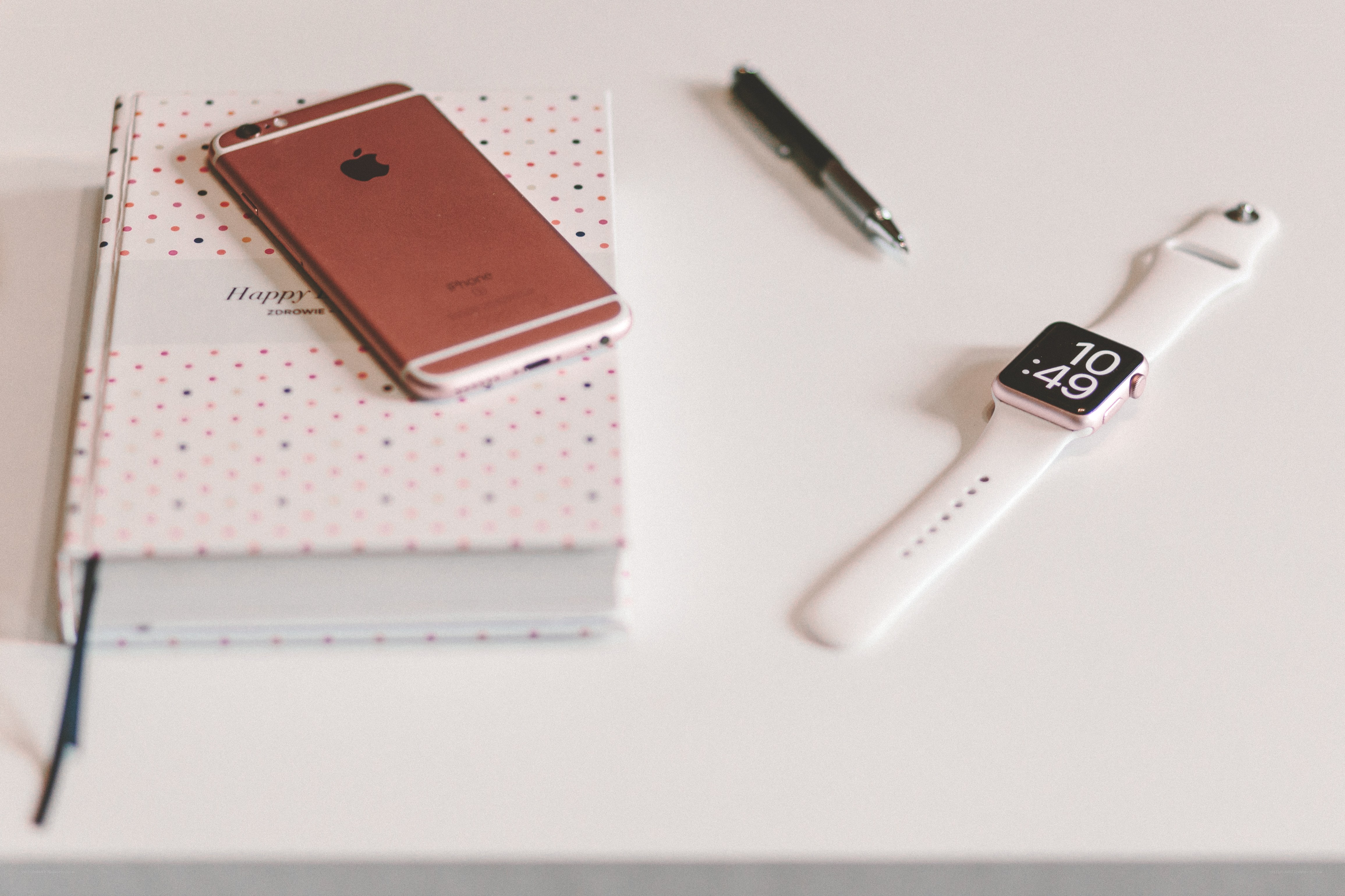 smartwatch and phone on desk