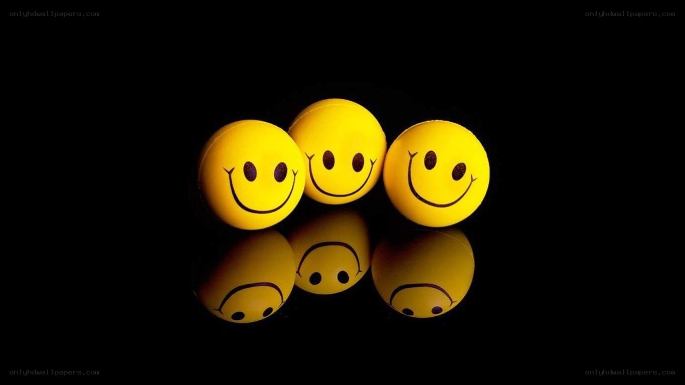 Smiley face balls on black