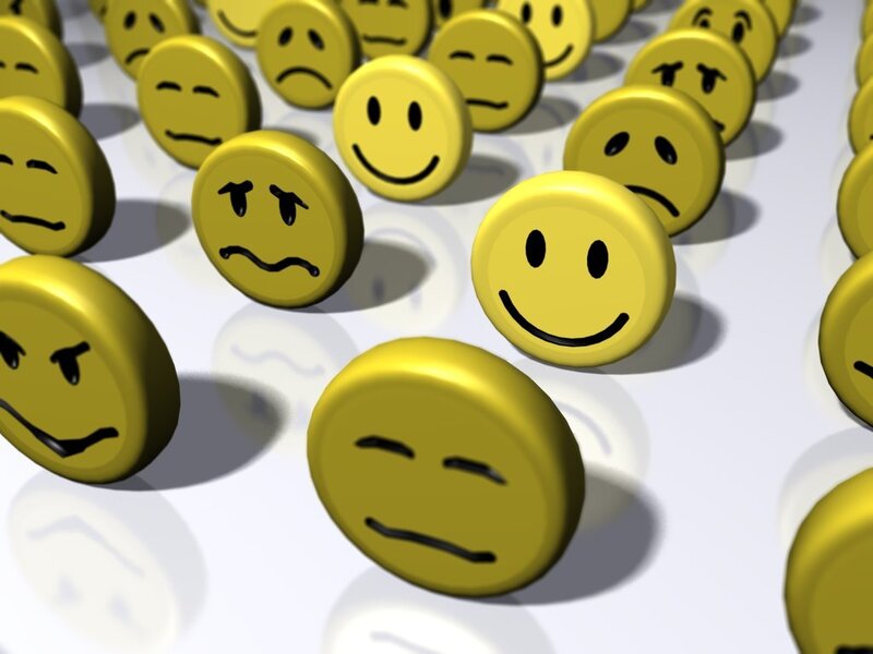 smiley face icons with different expressions