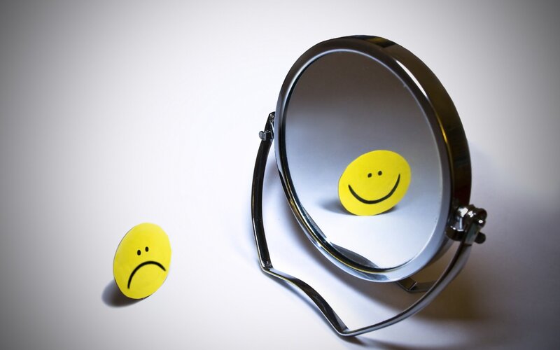 Smiley face mirror reflection