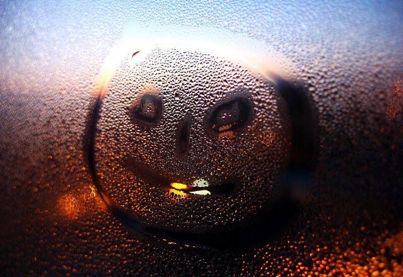 Smiley Face on Fogged Glass — Brown
