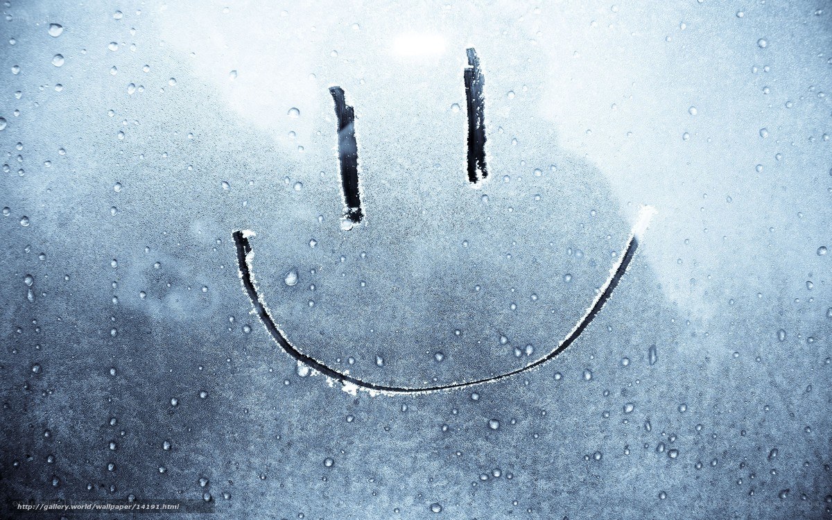 smiley face on fogged glass