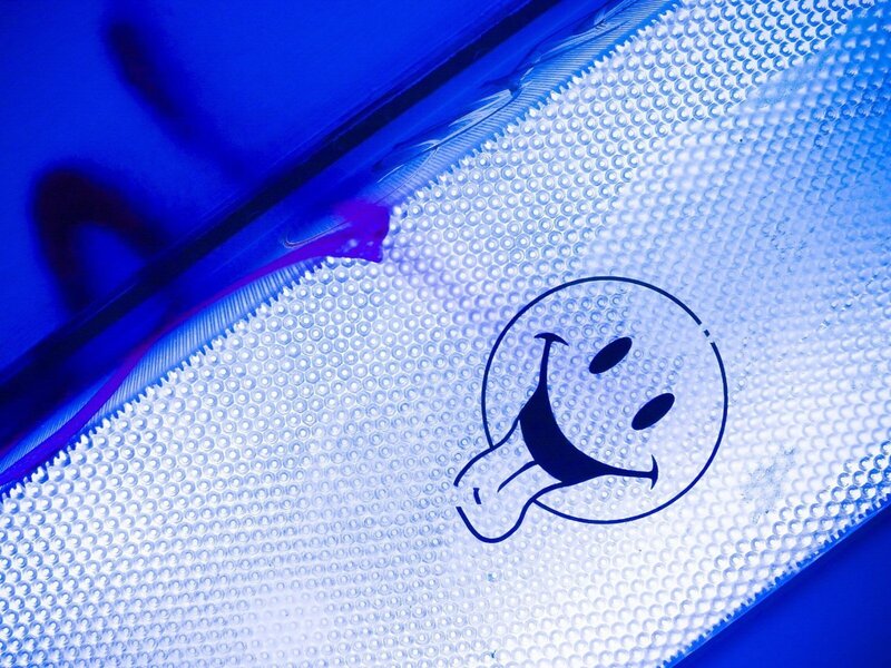 Smiley face on textured surface