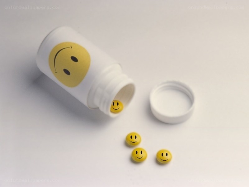 Smiley face pills in a bottle