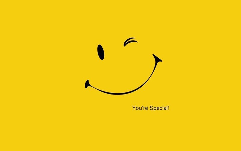 smiley face with winking eye