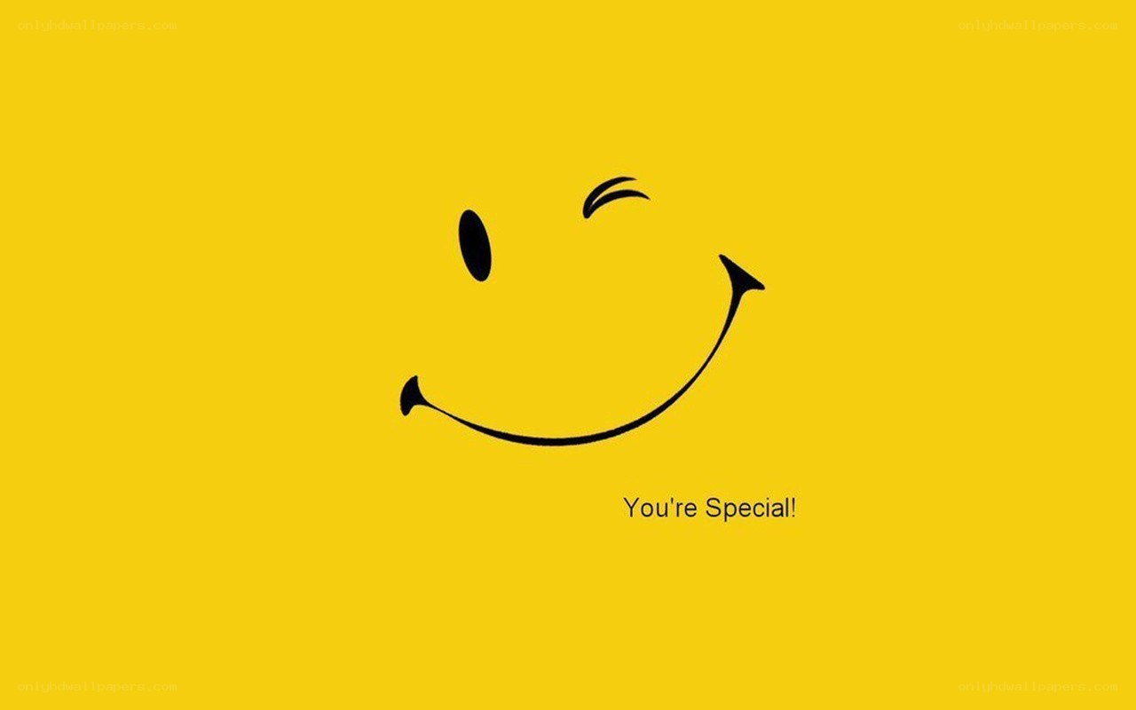 smiley face with winking eye