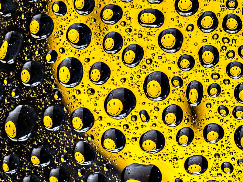 Smiley Faces under Water Droplets