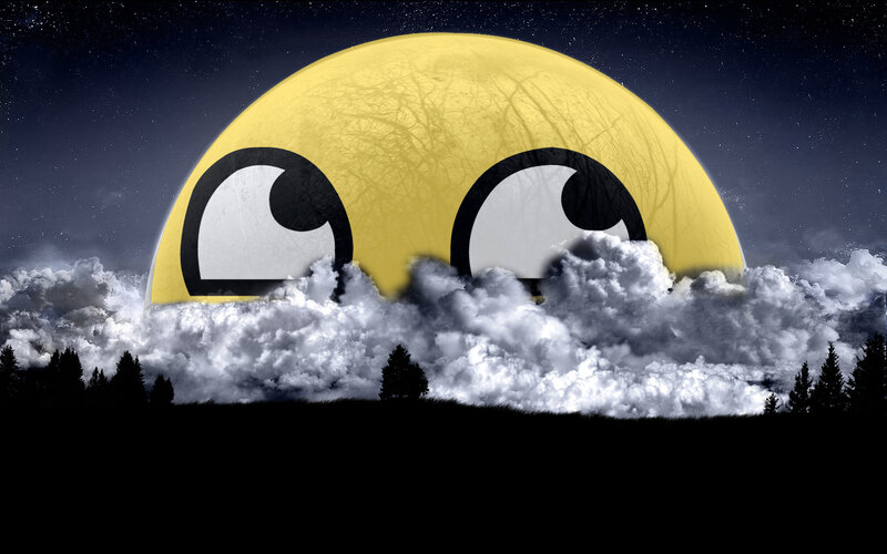 smiley moon over clouds