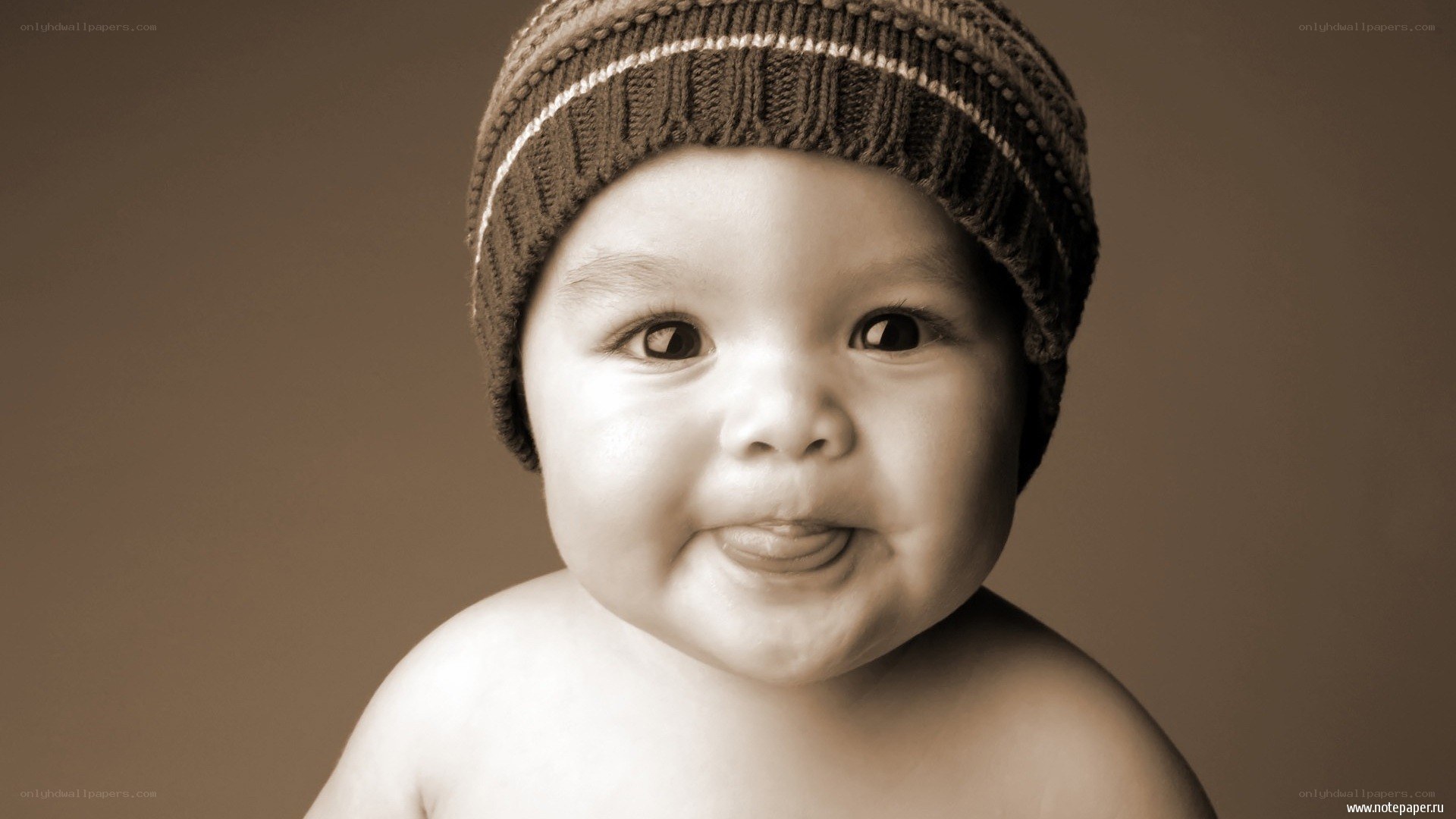 smiling baby in hat