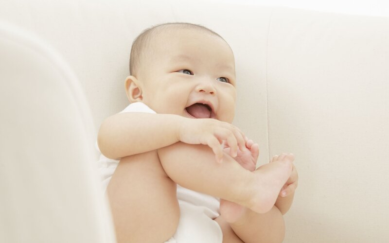 Smiling Baby Lying Down — White, Happy