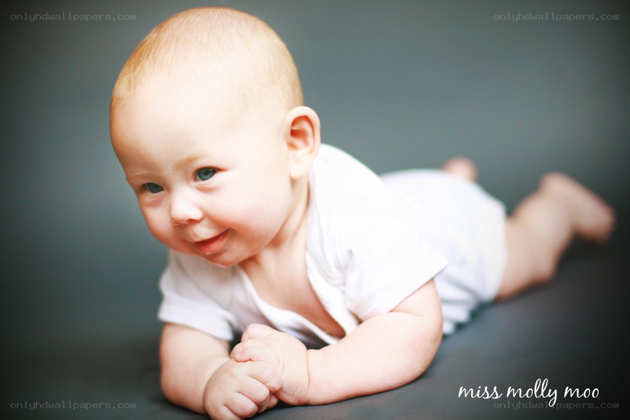 smiling baby on stomach