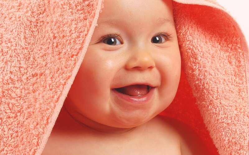 Smiling Baby Wrapped in Towel — Pink, Happy