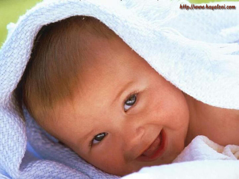 Smiling Baby Wrapped in Towel — White