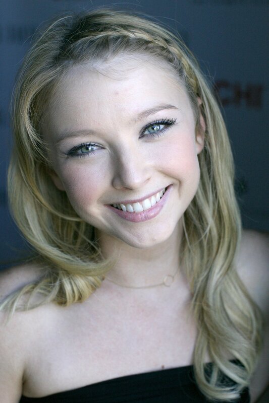 smiling blonde woman at event