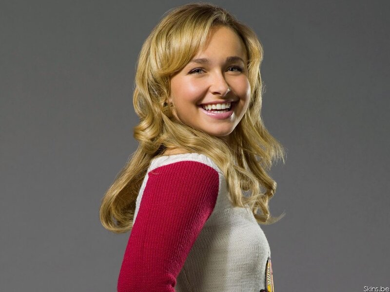smiling blonde woman in sweater