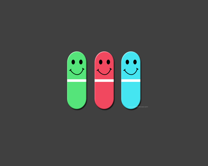 smiling capsules in green red and blue