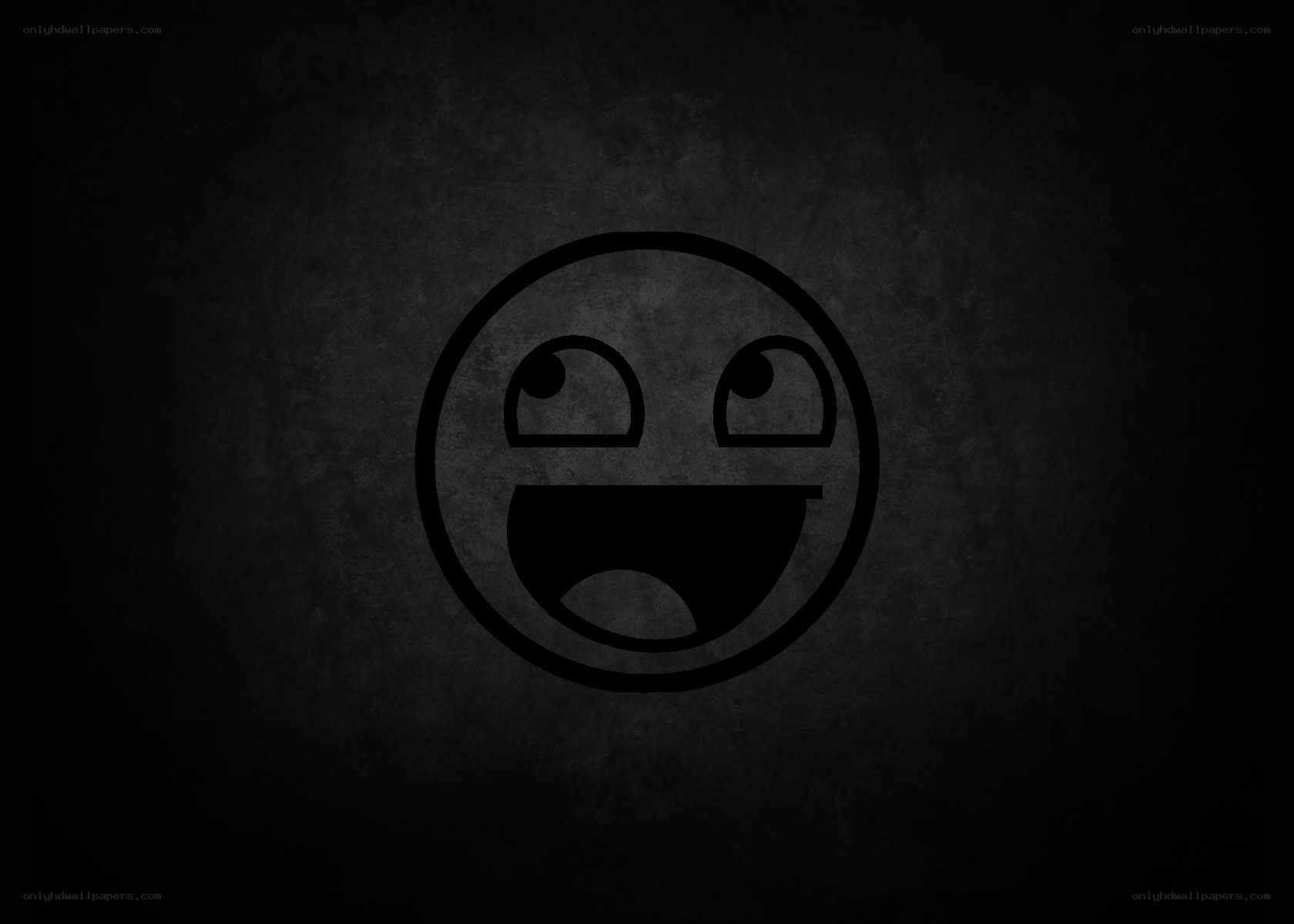 smiling face emoji on dark background