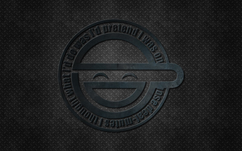 Smiling face logo on metal