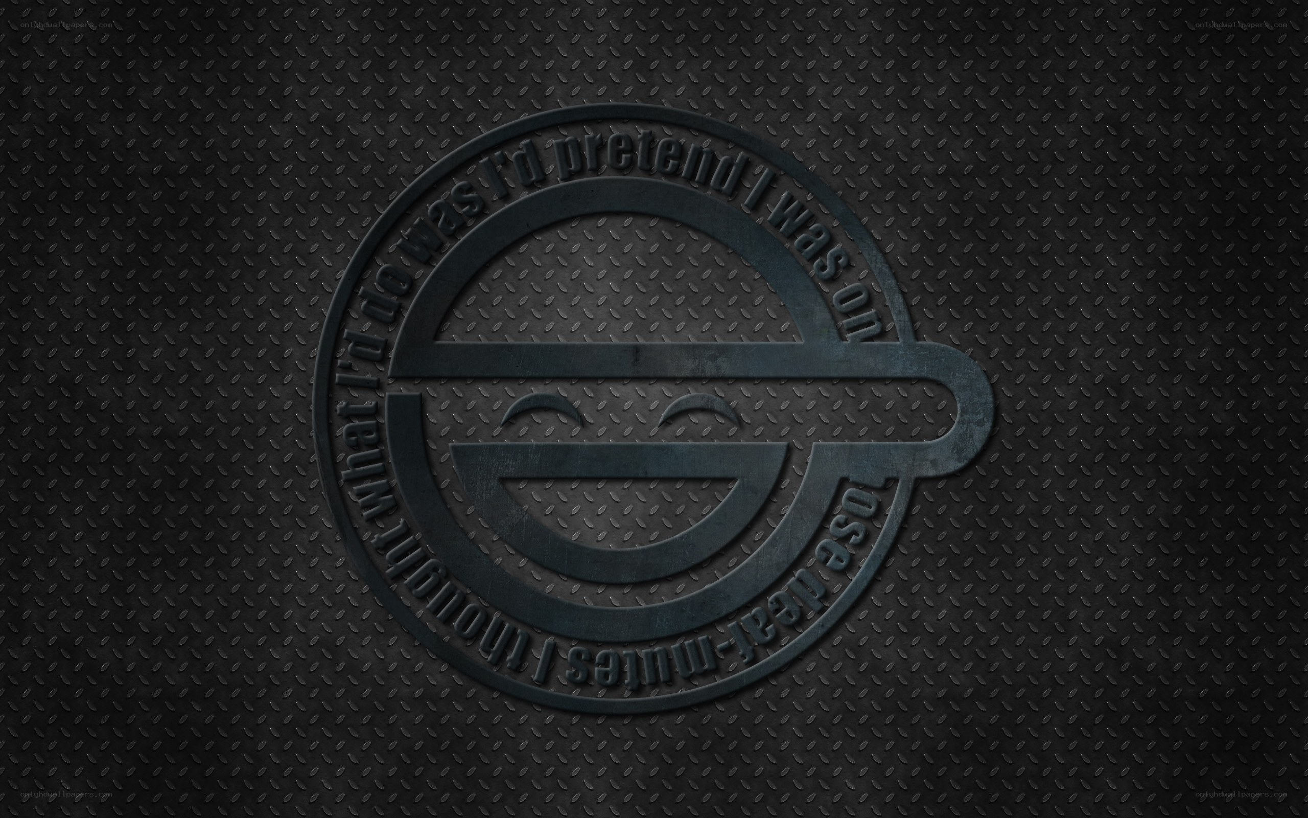 Smiling face logo on metal