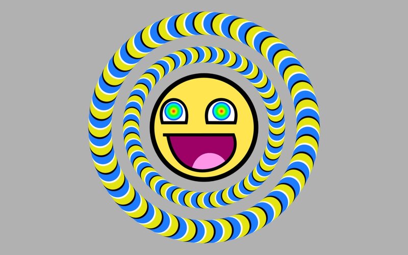 smiling face with hypnotic rings