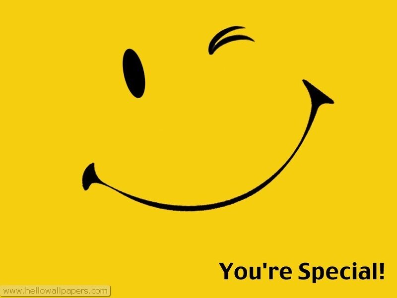 Smiling face with wink