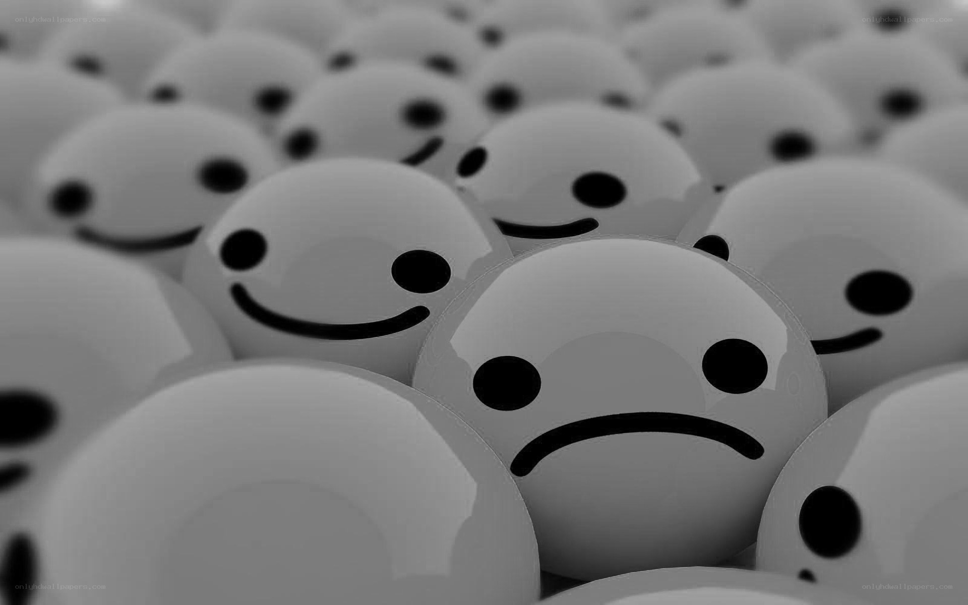 smiling faces with one sad face