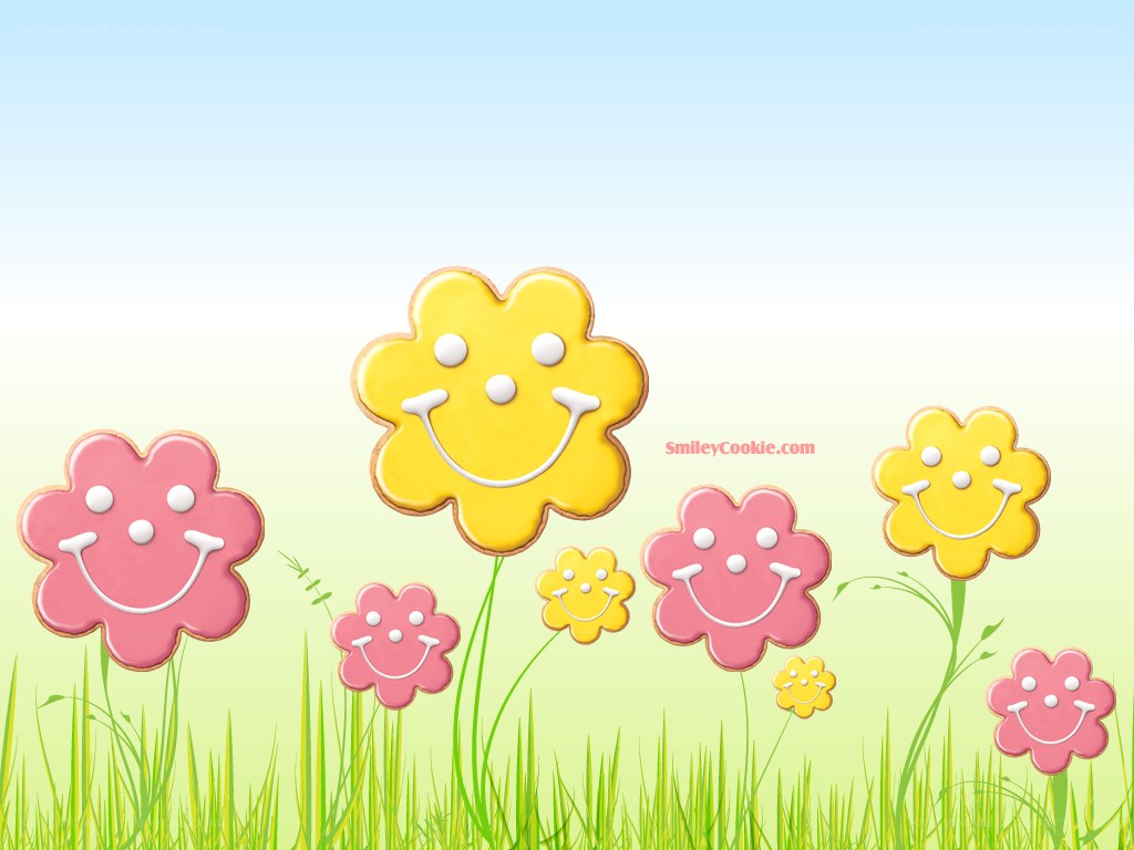Smiling flower cookies in a field