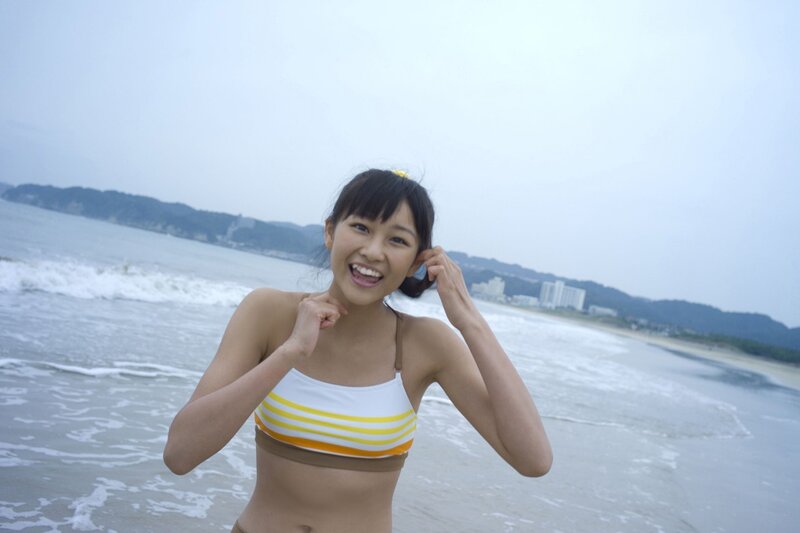 Smiling girl at the beach