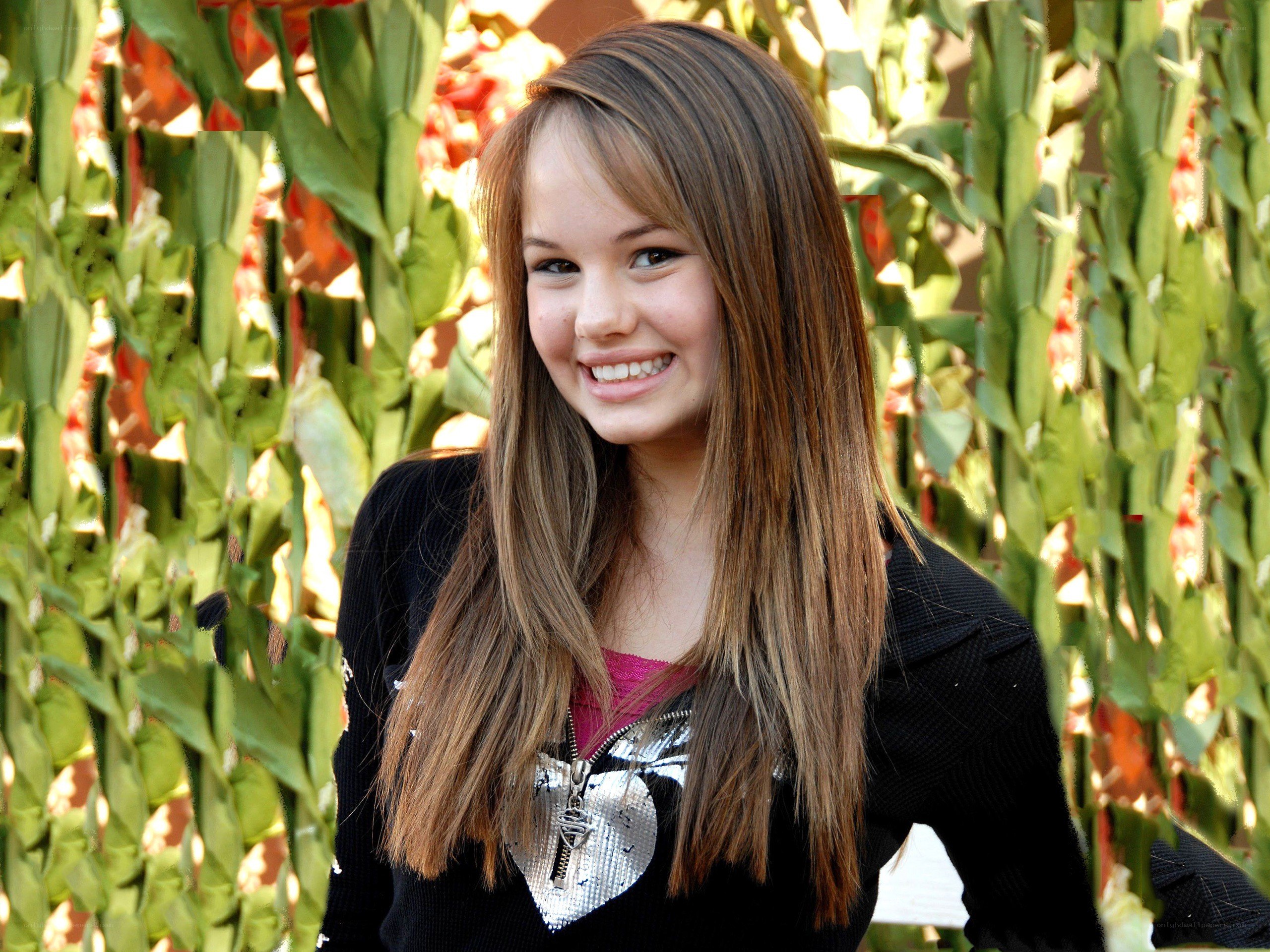 smiling girl in black jacket
